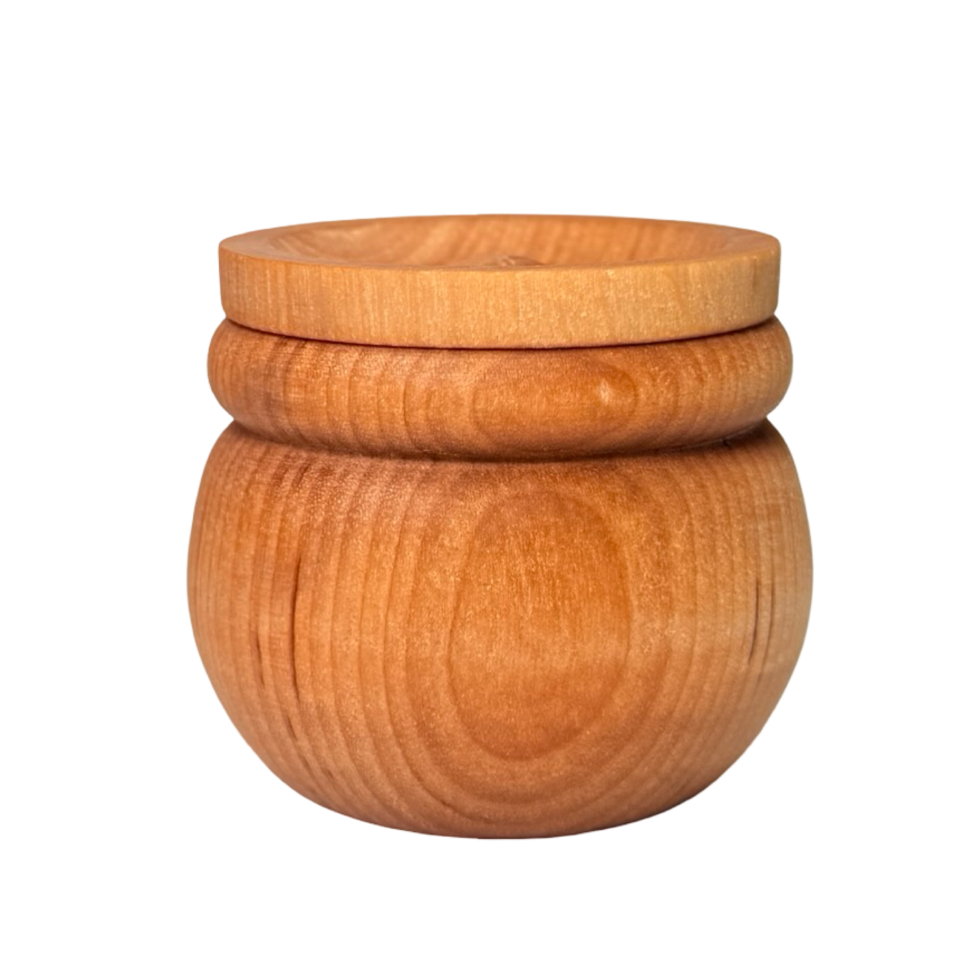 Small round wooden pinch pot with a fitted lid, shown closed.