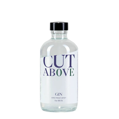 Clear 6-oz bottle labeled “Cut Above Gin, Zero Proof Spirit,” clear liquid with black cap