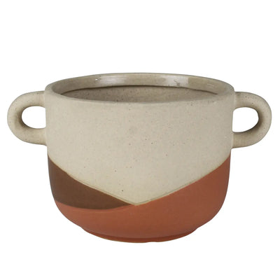 Two-handled ceramic cachepot with a speckled upper half and warm clay-toned lower half.