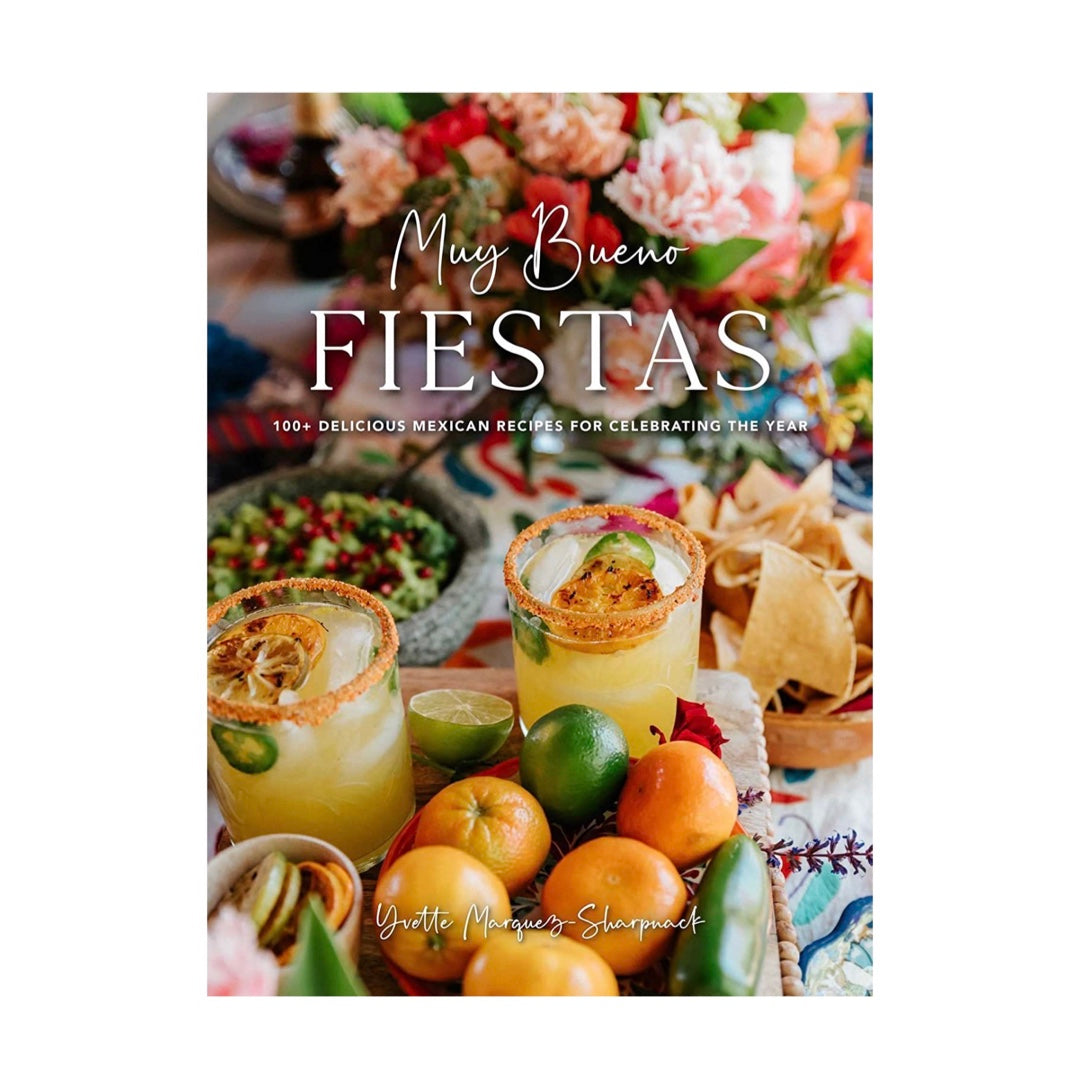 Cover of Muy Bueno Fiestas Book featuring a colorful tabletop with food items 