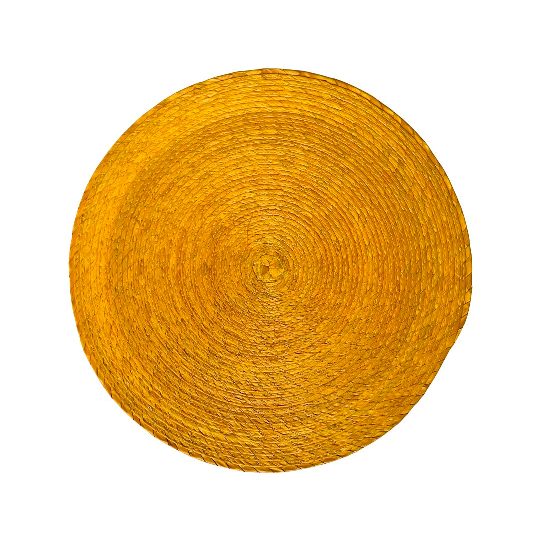 Round Tangerine colored palm placemat