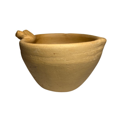 side view photo of heart shaped clay bowl