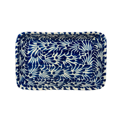 top view of a blue and white Puebla design rectangular ceramic dish
