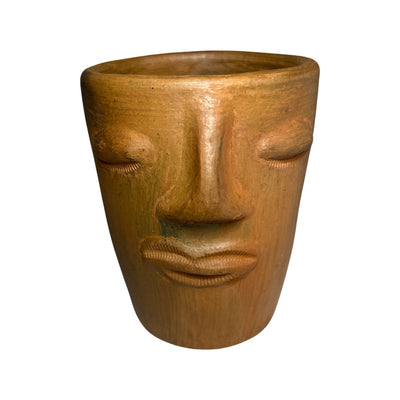 alternate front view photo of clay cup with handsculpted face design