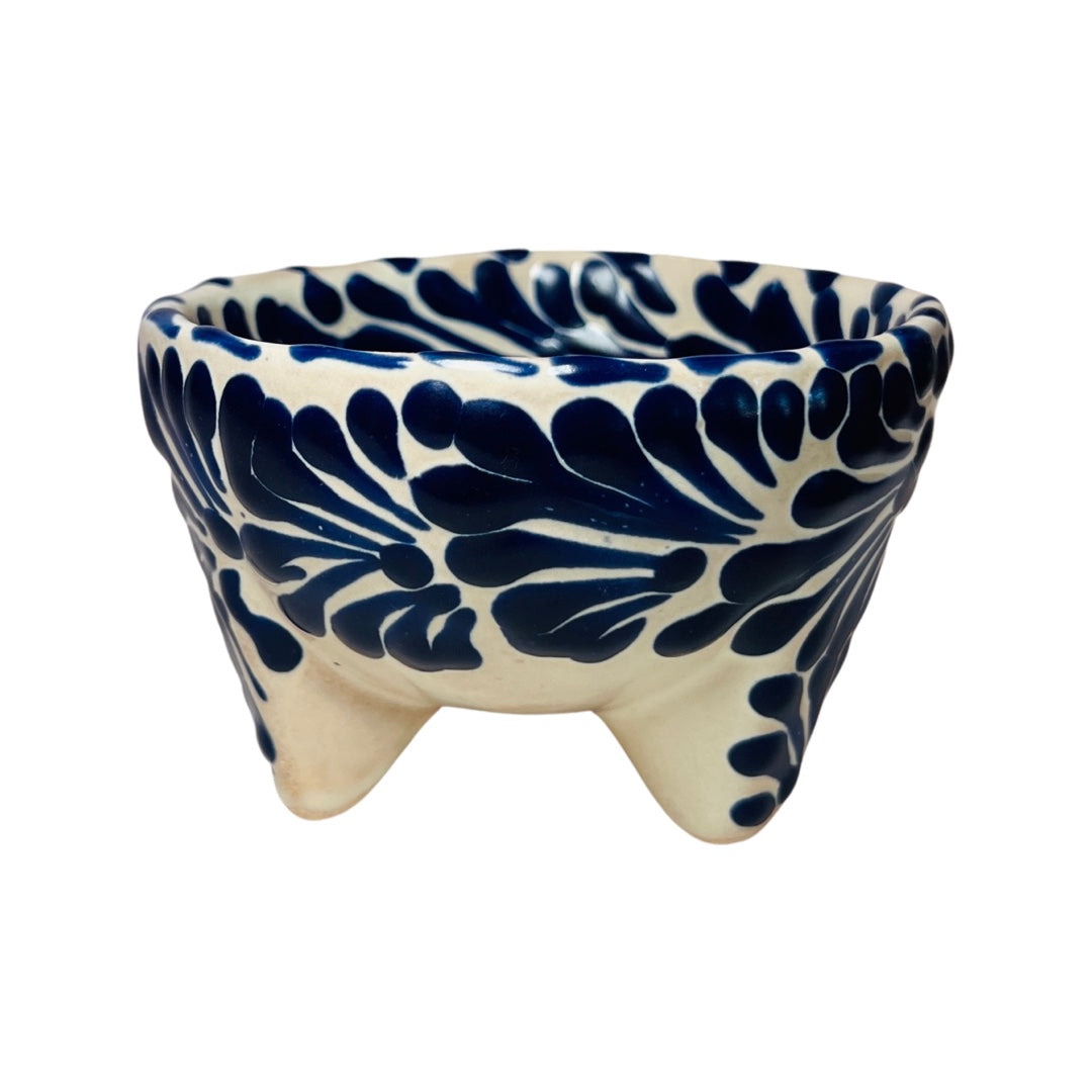side view of a blue and white Puebla design ceramic salsero