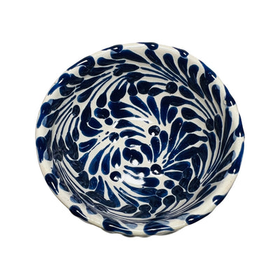 top view of a blue and white Puebla design ceramic bowl