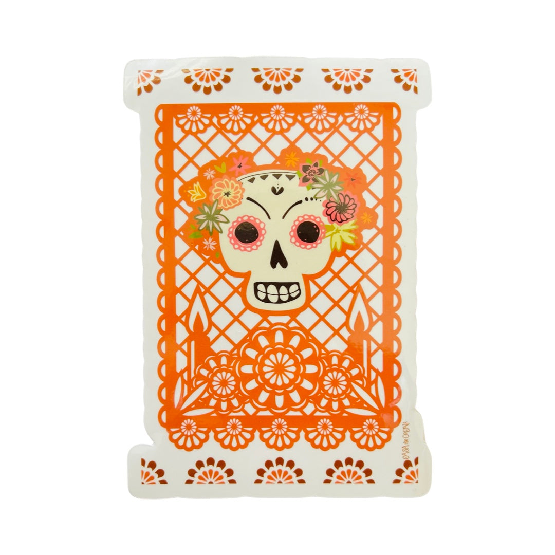 clear background sticker with an orange papel picado design and features a sugar skull in the center with a flower crown. 