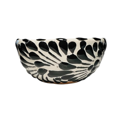 side view of a black and white Puebla design ceramic bowl