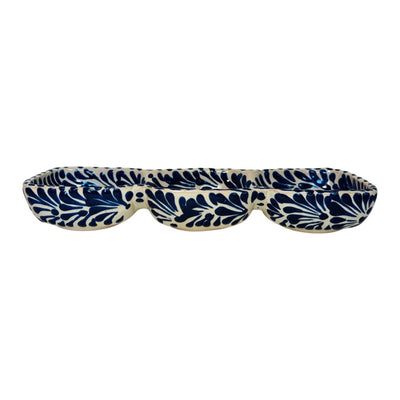 side view of a blue and white Puebla design rectangular ceramic trio appetizer dish