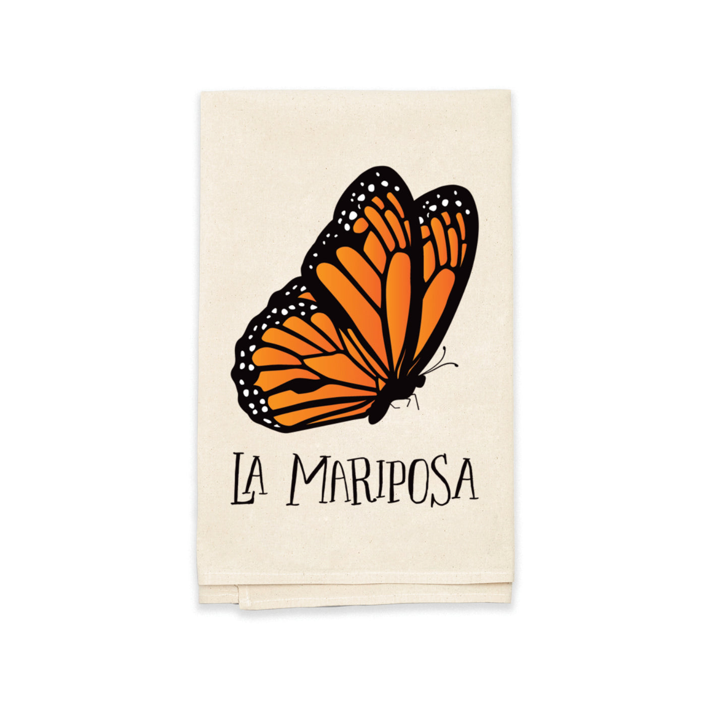 beige towel with an image of a monarch butterfly and the phrase La Mariposa in black lettering