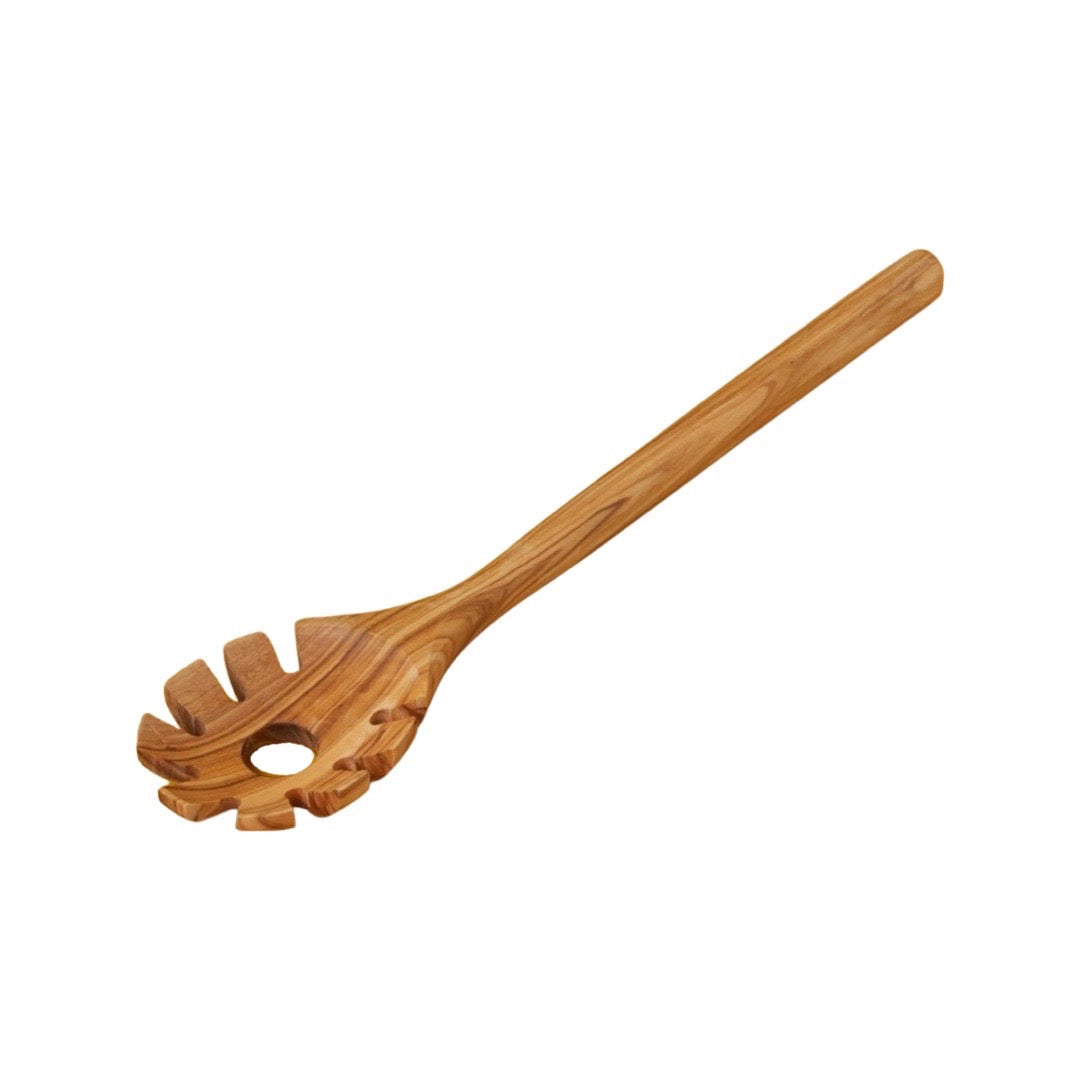 top view of pasta spoon carved from wood