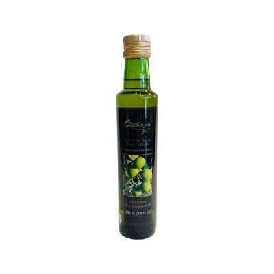 Front view of Olibaja Extra Virgin Olive Oil in translucent green glass bottle with gold colored lid