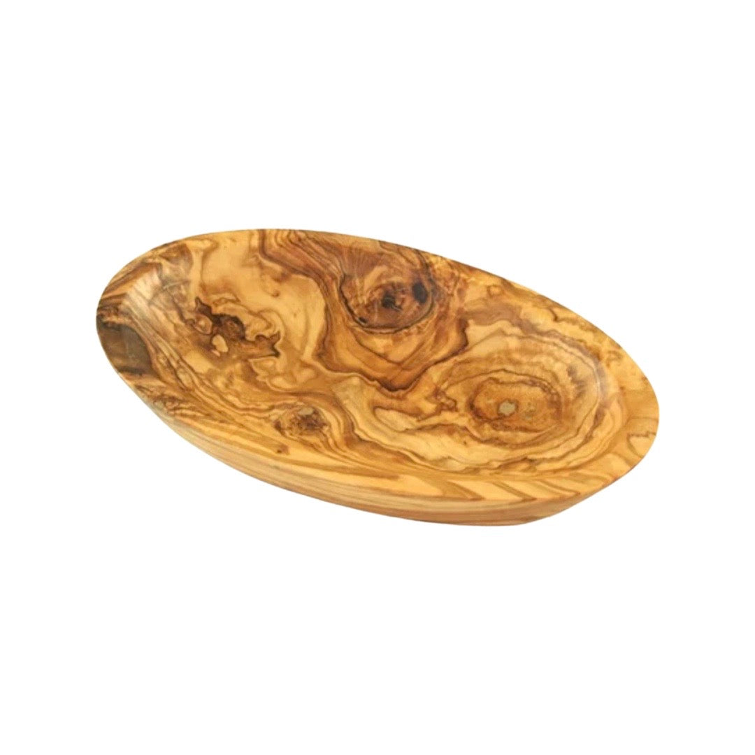 top view of oval shaped bowl carved from wood