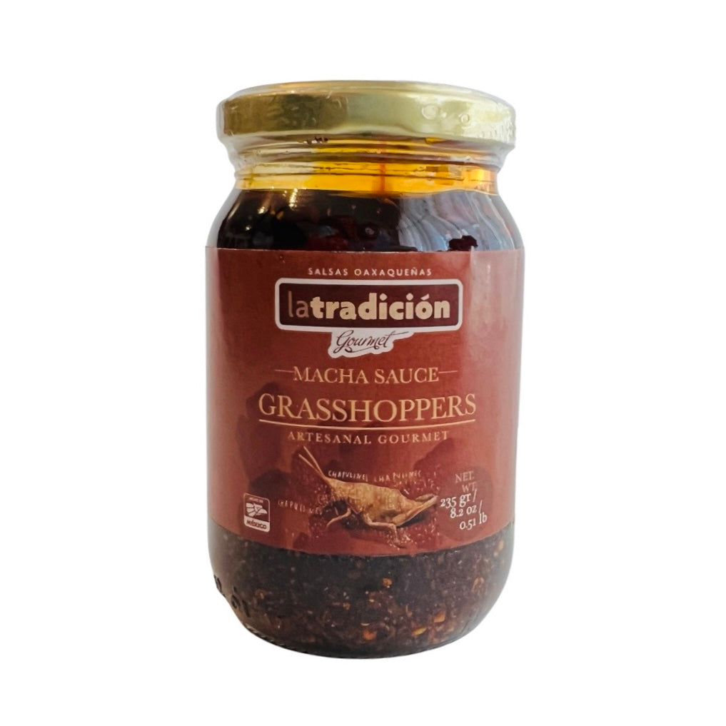 front view of Salsa Macha de Chapulin in clear glass branded jar