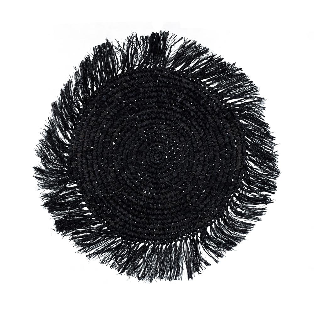 Circular black placemat with fringe around edges