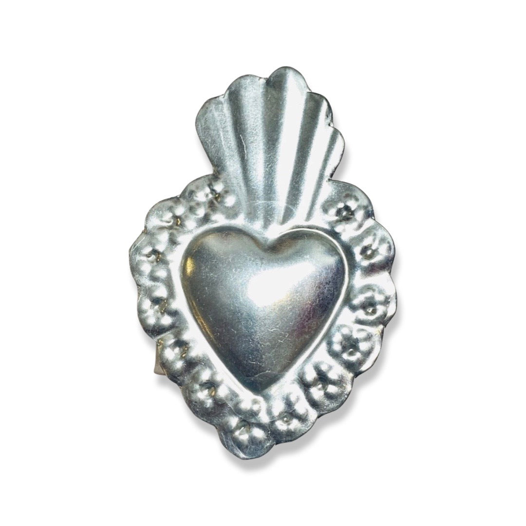 silver napkin ring with a silver heart design