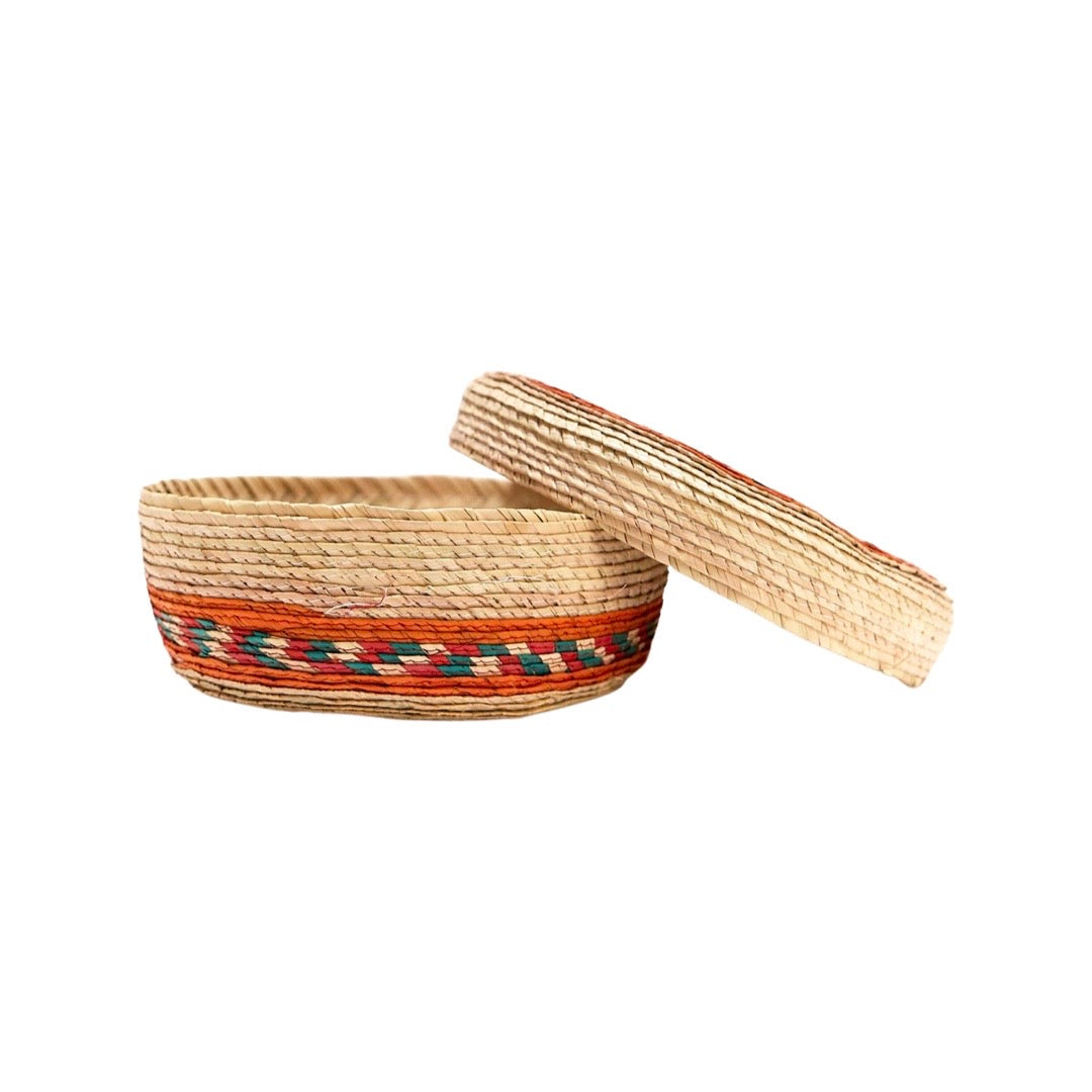 front view of Palm Tortilla Basket with lid slightly ajar