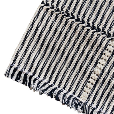 quarter folded napkin with black and white stripes