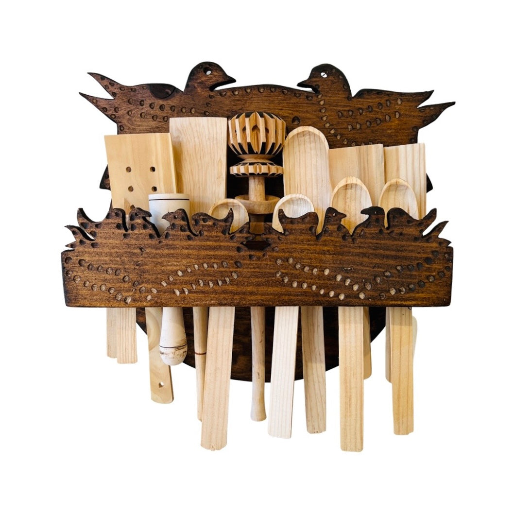 Michoacán Cucharero wood spoon holder front view with all included utensils and features a bird design.