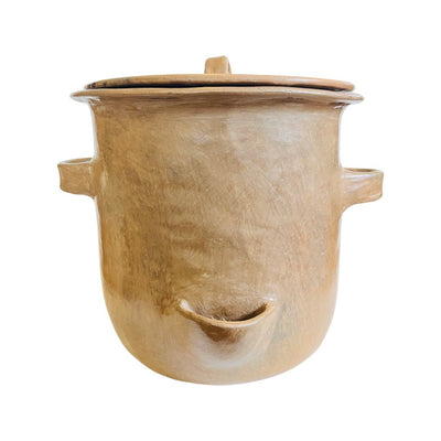 Front view of a light tan clay tamalero, or tamale steam pot, with handles.