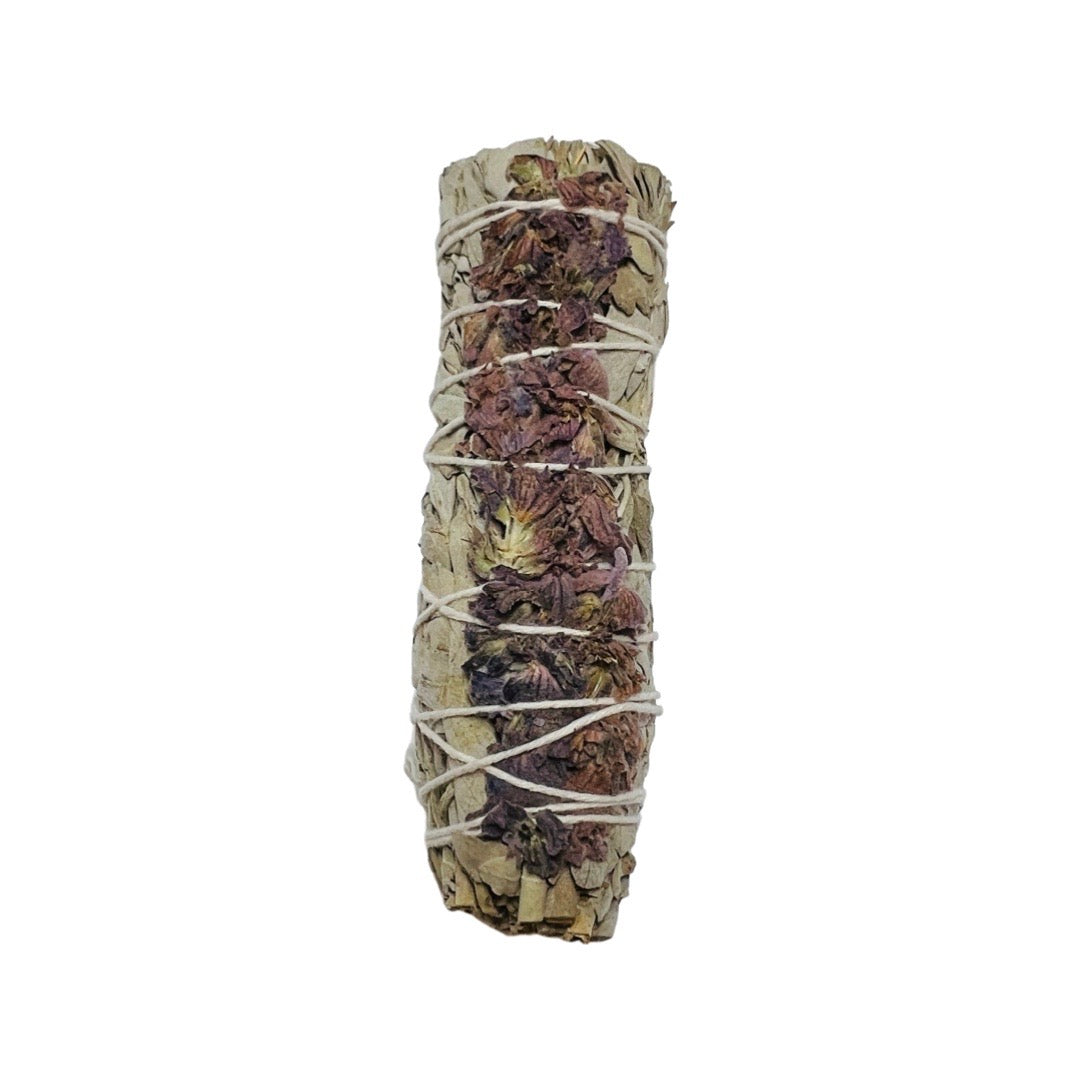 Cylindrical White sage and lavender bundle bound together by string