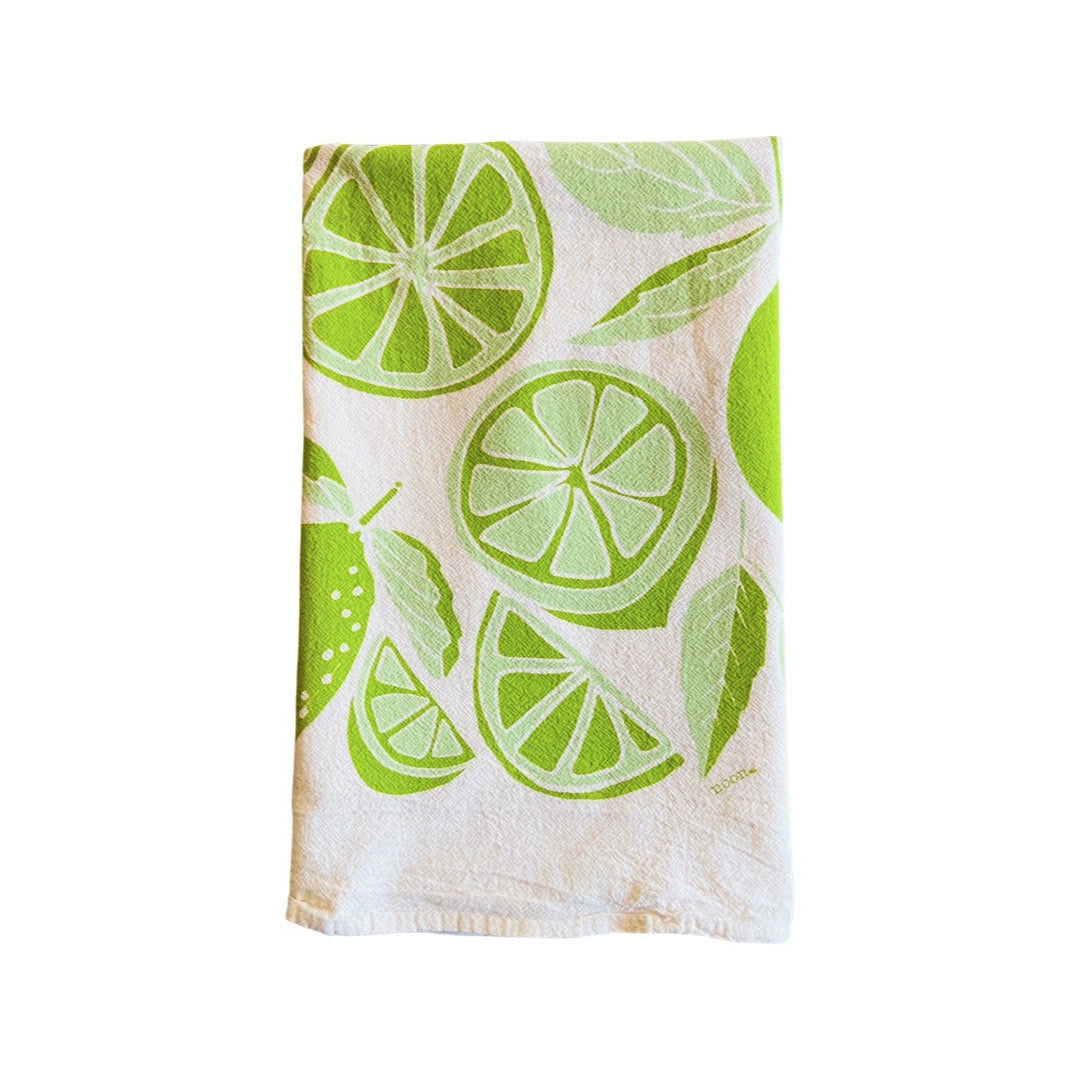folded Limes Tea Towel features graphic of sliced limes