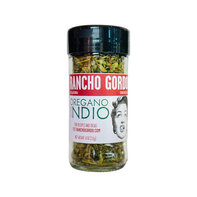Front view of Oregano Indio in clear glass branded jar with black lid