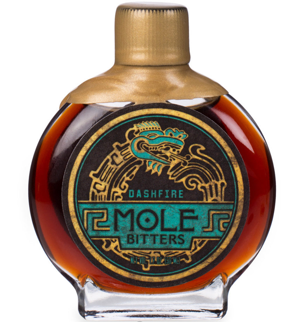 front view of Mole cocktail bitters in branded circular bottle, lid is sealed with gold colored wax