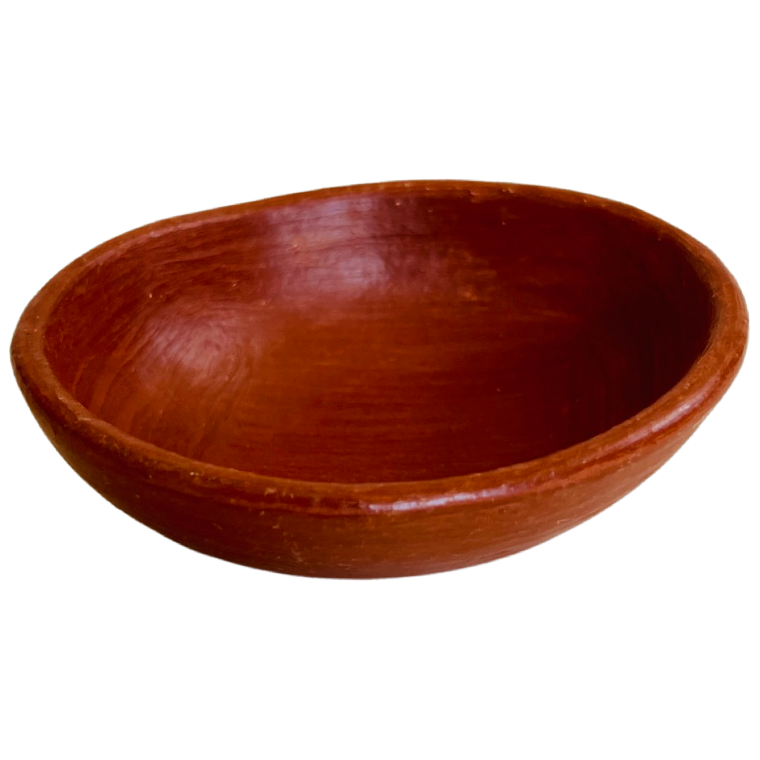 Front view of Red clay oval nesting bowl.