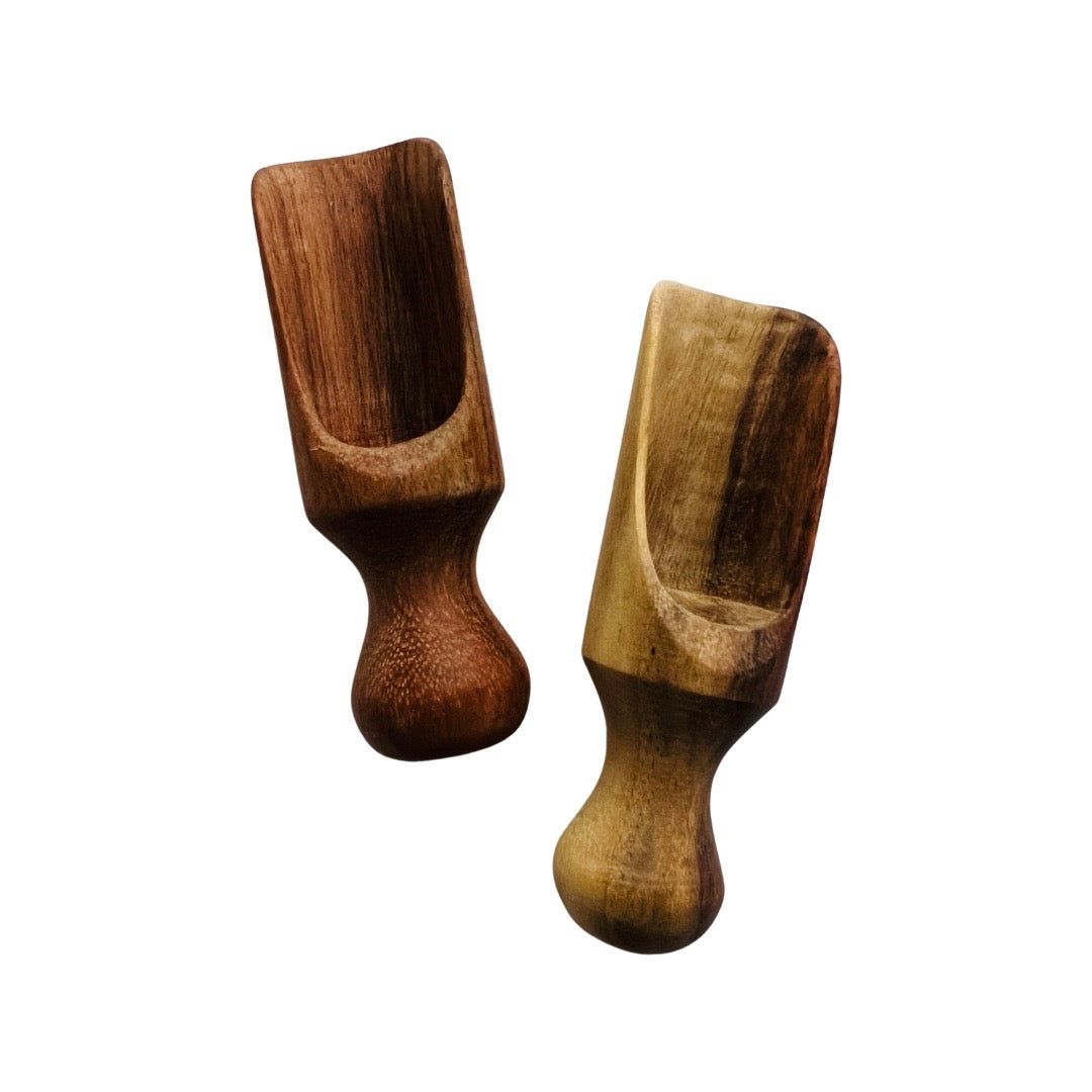 Two mini wooden scoopers.