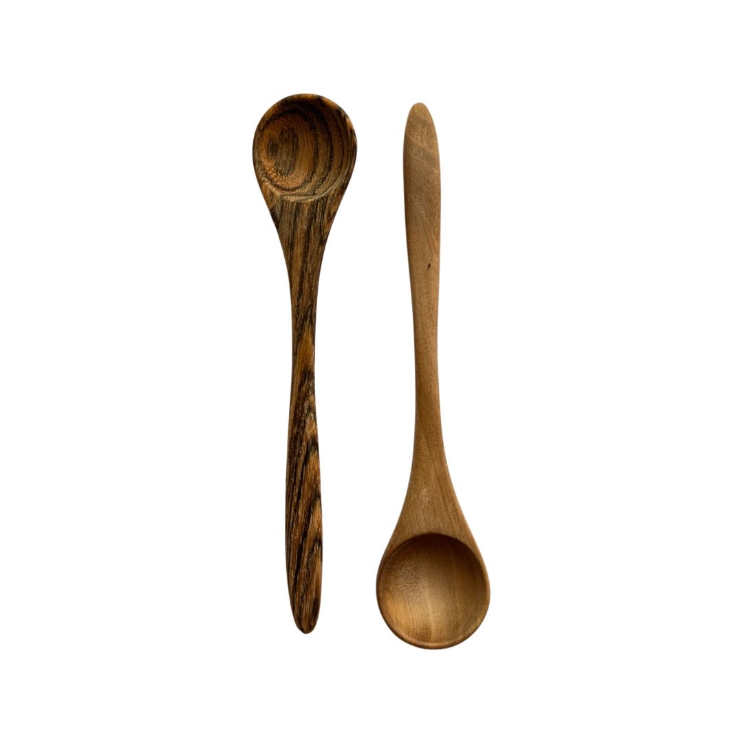 Two small condiment wooden spoons.
