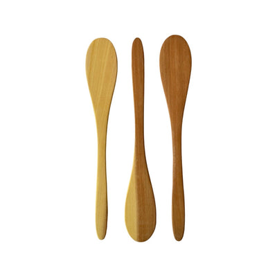 Three wooden cooking spoons.