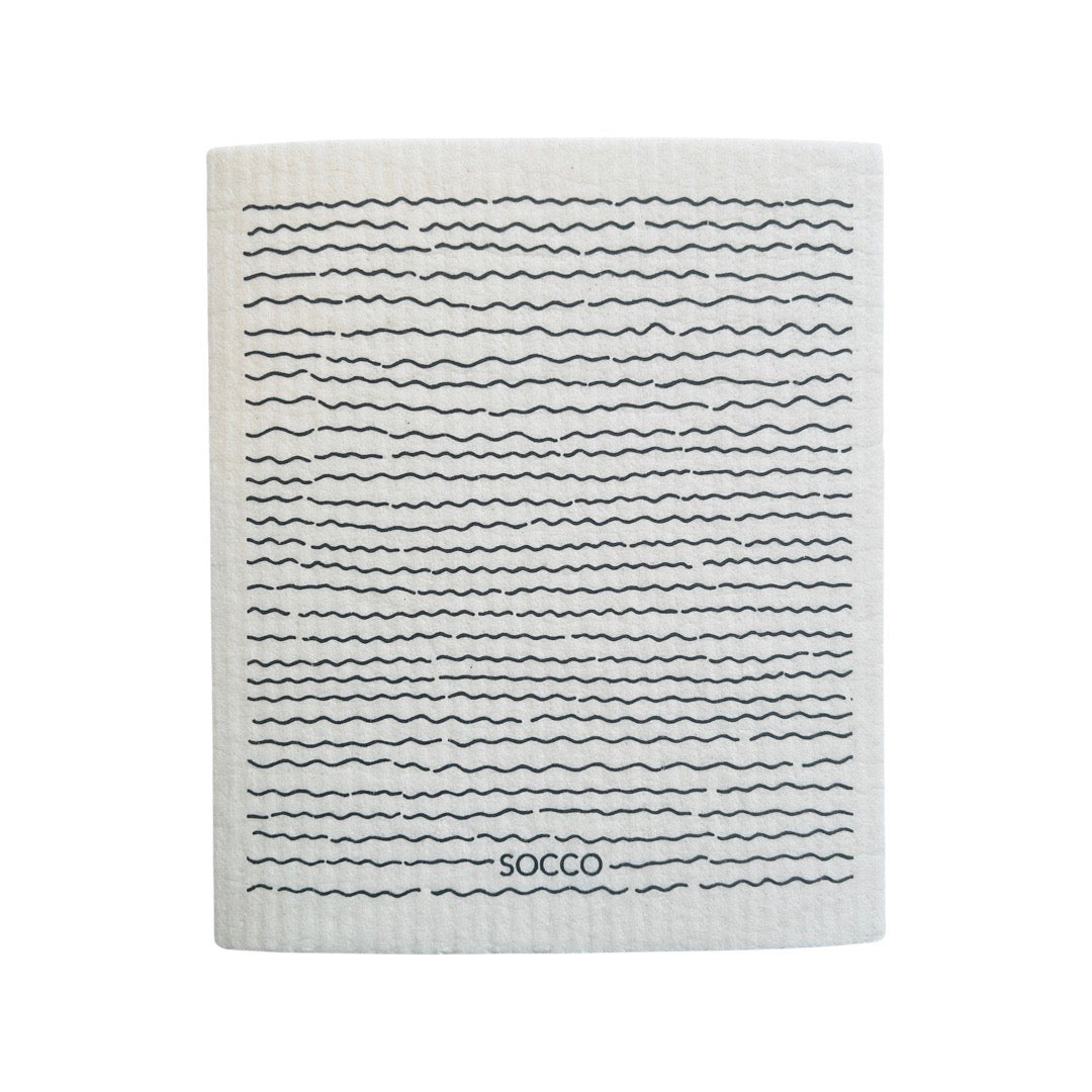rectangular swedish cloth featuring printed graphic of squiggly horizontal lines 