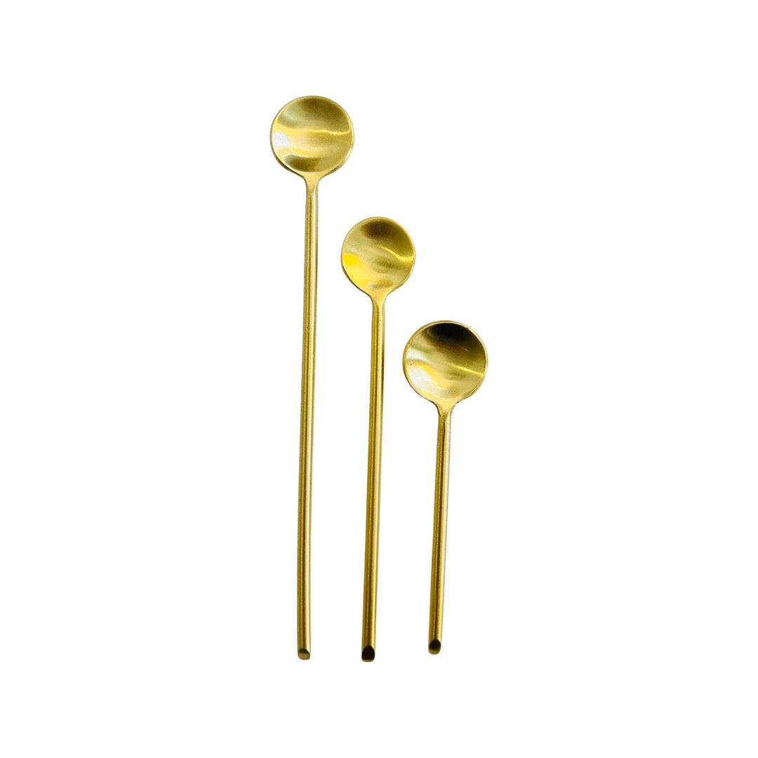Top view of three gold thin spoons in large, medium, and mini.