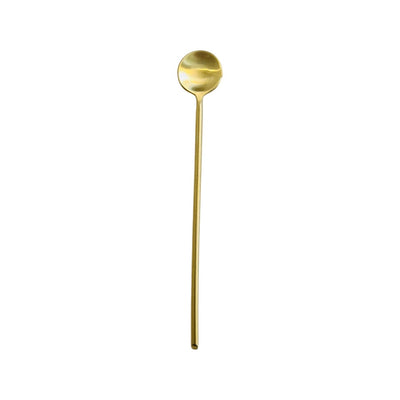 Top view of gold thin long spoon.