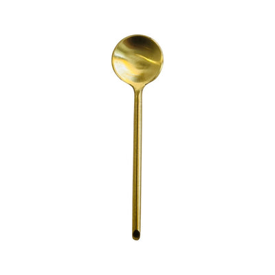 Top view of gold thin spoon.