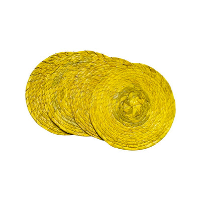 4 yellow circular coasters made of palm