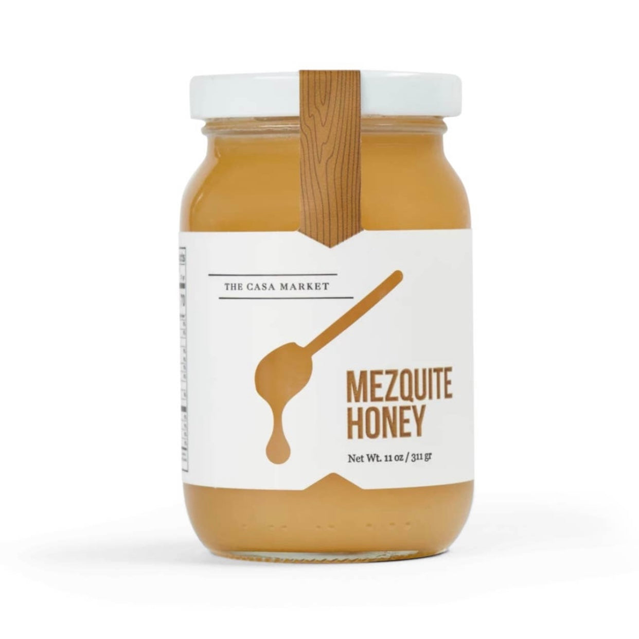 Large Mezquite Honey in an 11 ounce jar with a white branded label that features a honey dipper.