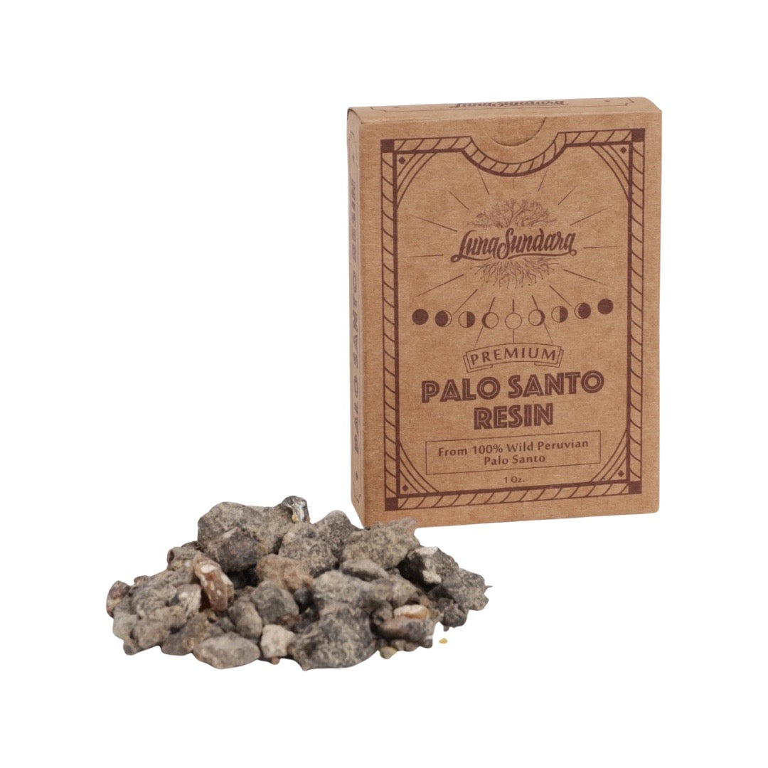 Palo santo resin next to branded packaging box.
