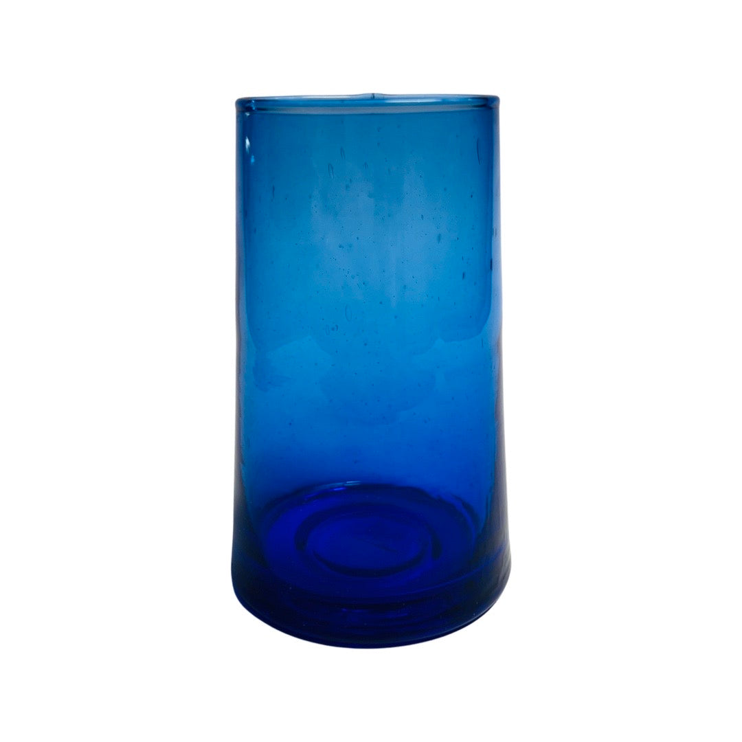 front view of translucent blue colored drinking glass