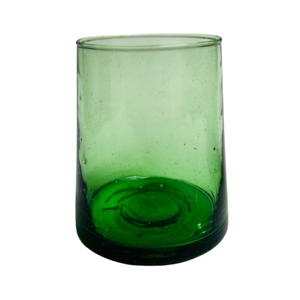 front view of translucent green colored drinking glass