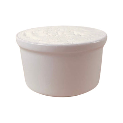 White cylindrical soap dish with soap inside