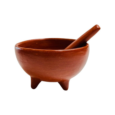 front view of Red clay footed salsa & spice bowl with red clay spoon.