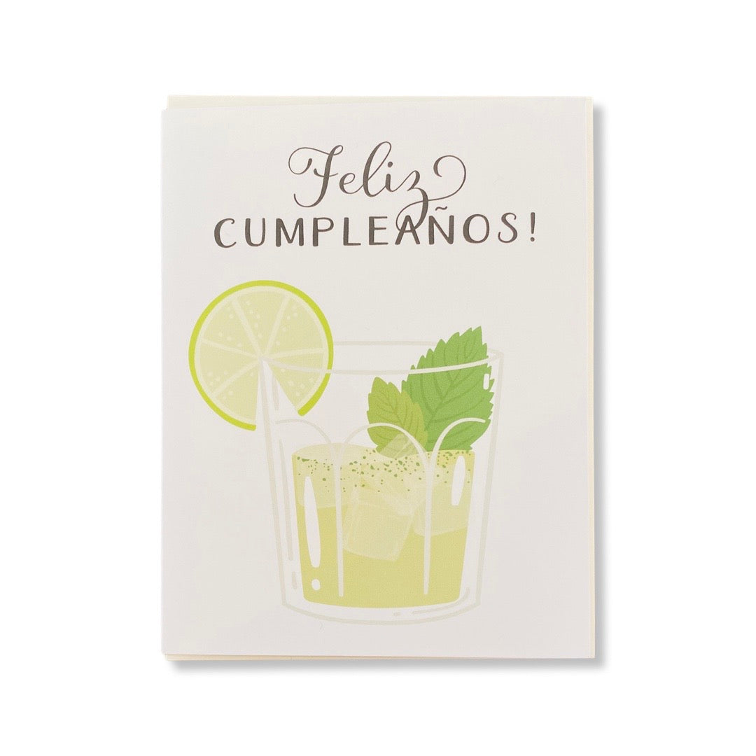 Greeting card reads: Feliz Cumpleanos, English translation is Happy Birthday. Illustration features a mojito cocktail.