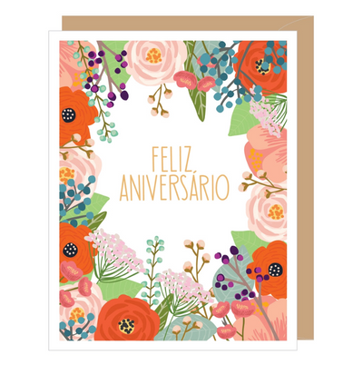 Greeting card reads Feliz Aniversario, English Translation is Happy Anniversary. Illustration features a colorful array of flowers surrounding the text in the middle. 