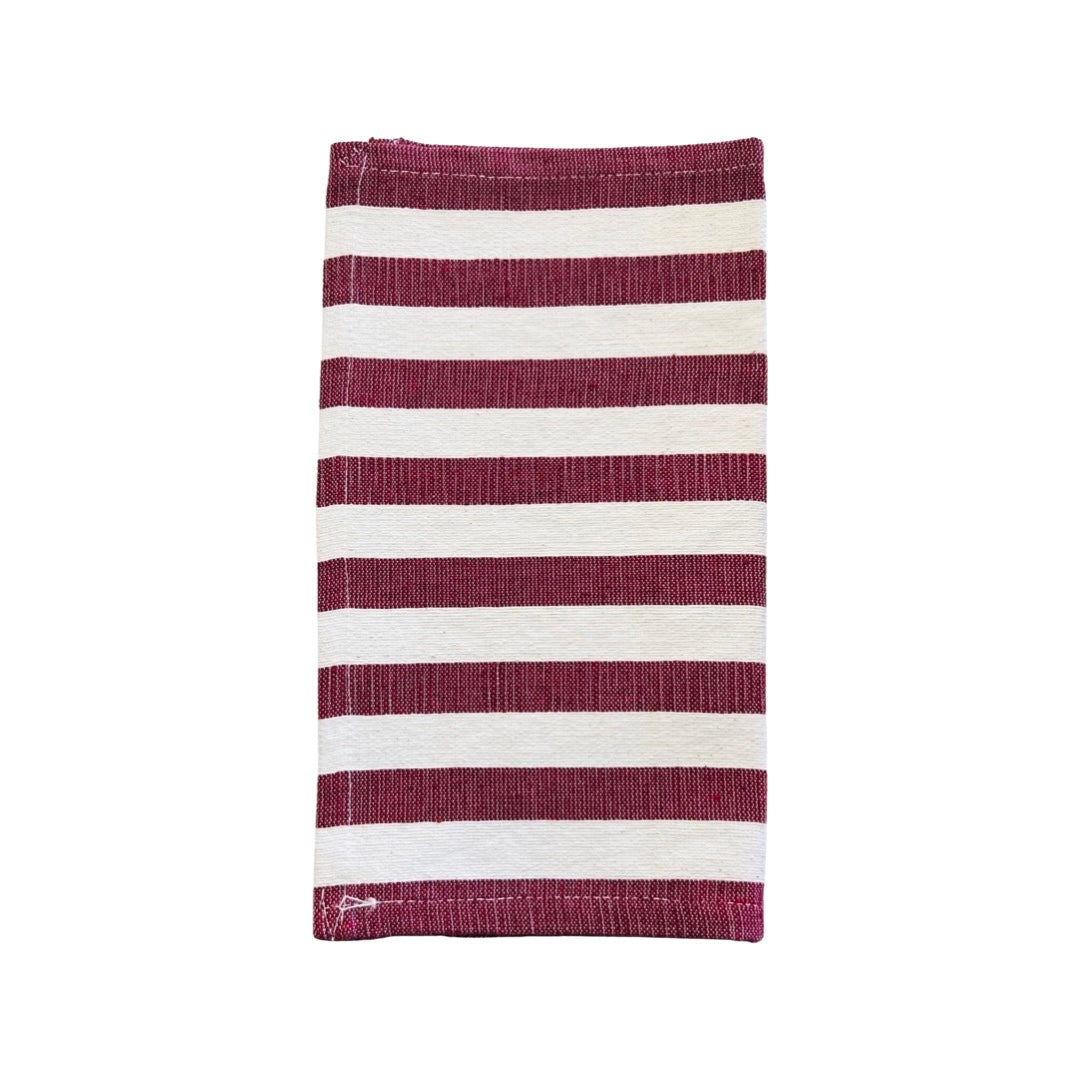 Natural and burgundy striped dish towel half folded