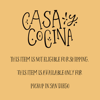 Sand colored square with the phrase Casa y Cocina. This item is not eligible for shipping. This items is available only for pickup in San Diego.