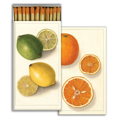 Set of matches with one box featuring the image of sliced orange and the other with a sliced lime and lemon