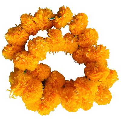 top view of garland with orange plastic flowers resembling marigolds