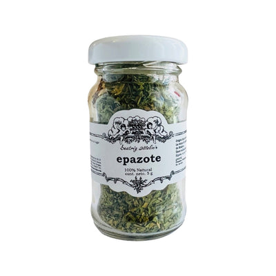 front view of Epazote in clear glass branded jar with white lid